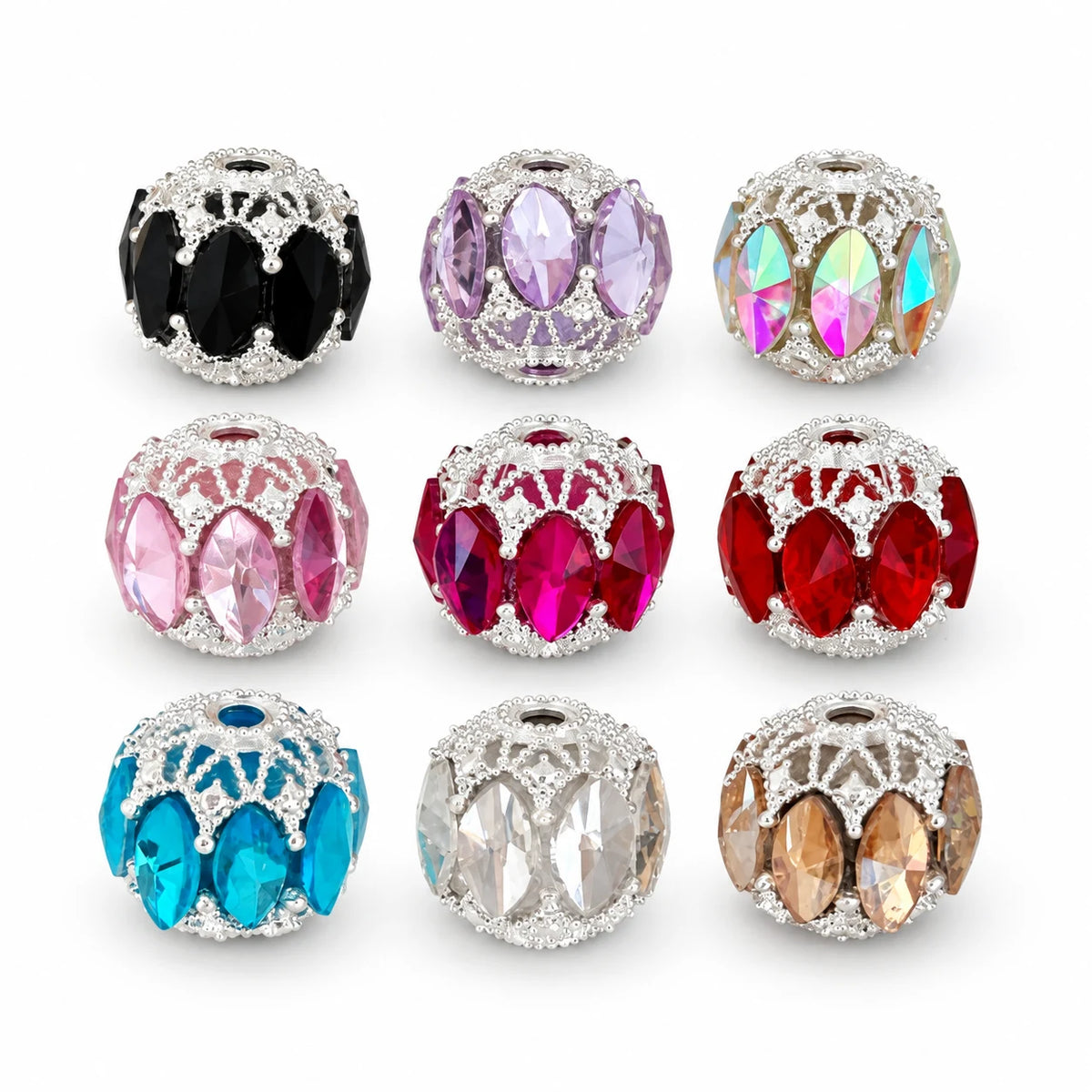 Example assortment of filigree focal beads in nine colors