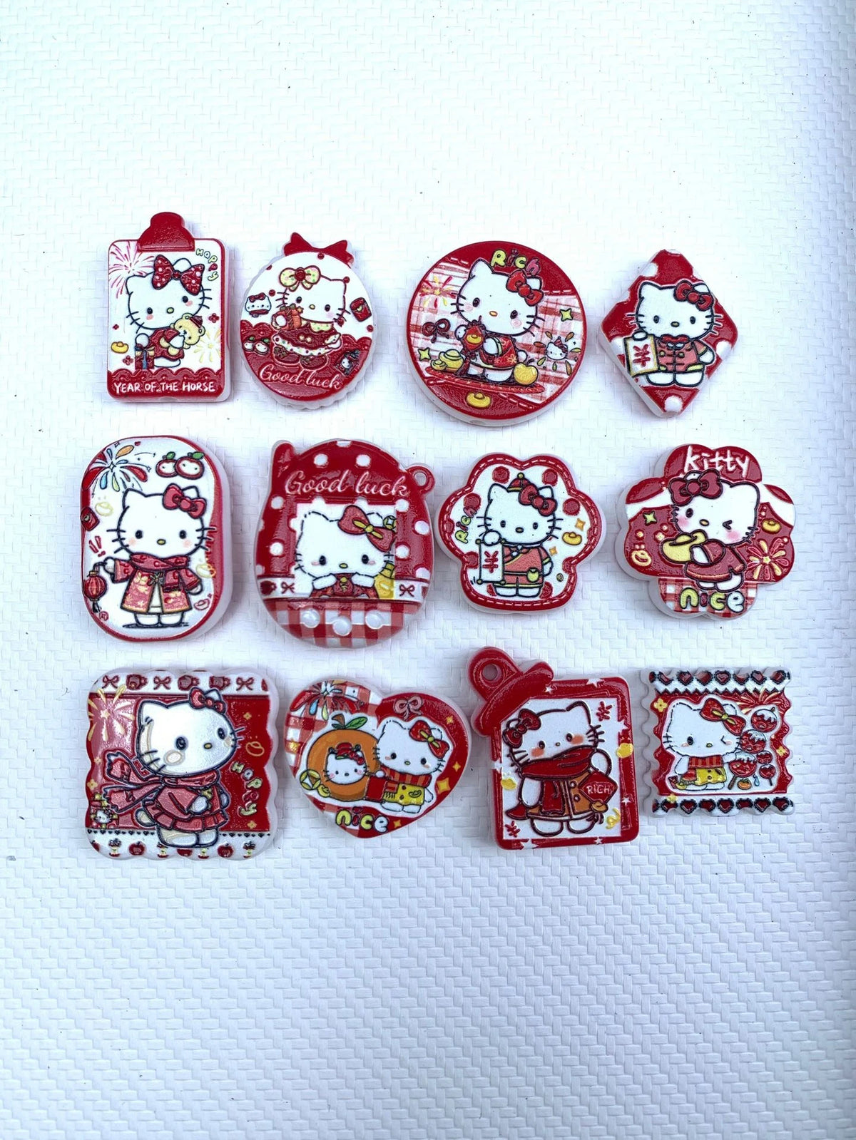 Example hello kitty new year acrylic focal bead assortment with printed designs